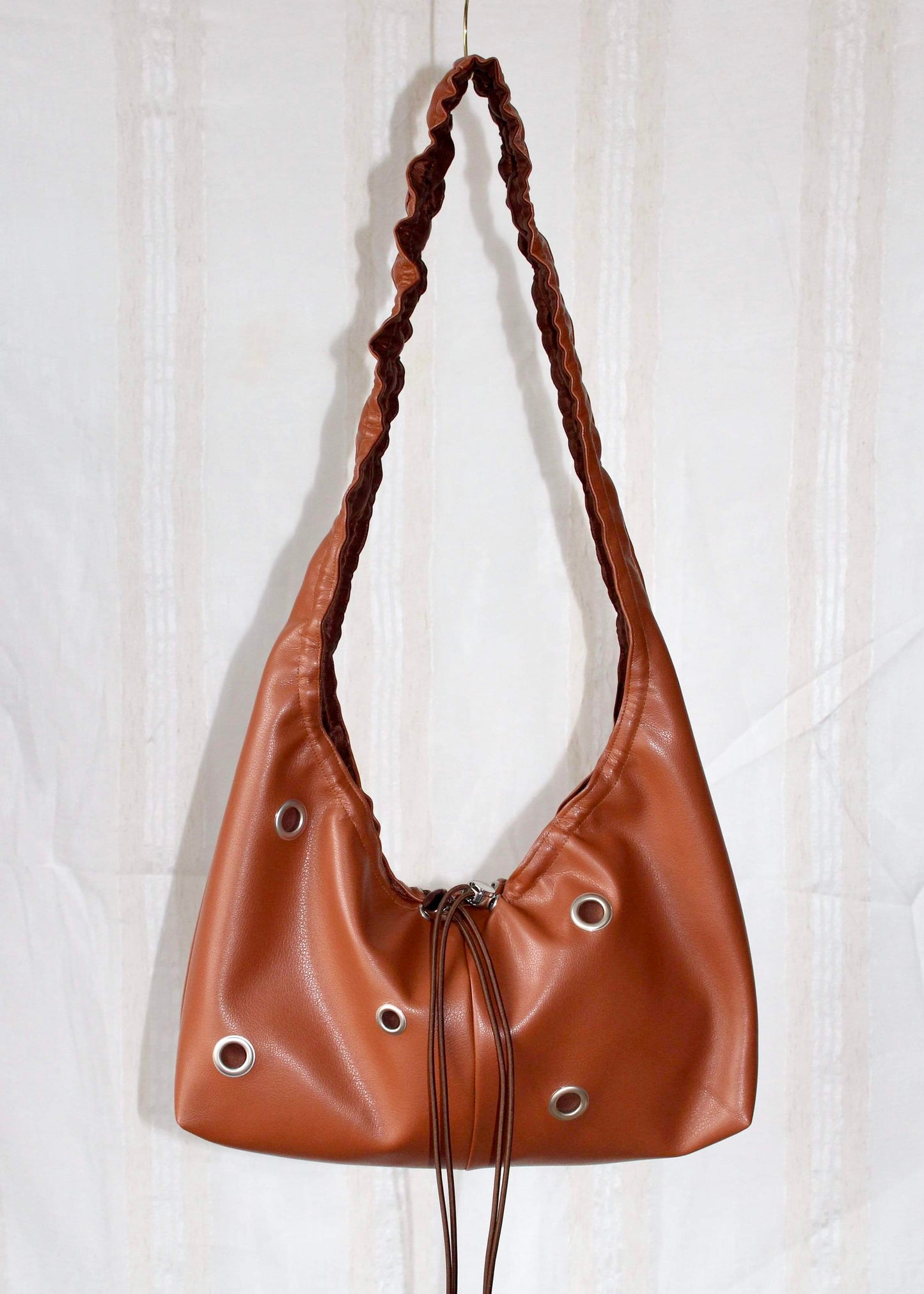 Cognac and brown bag