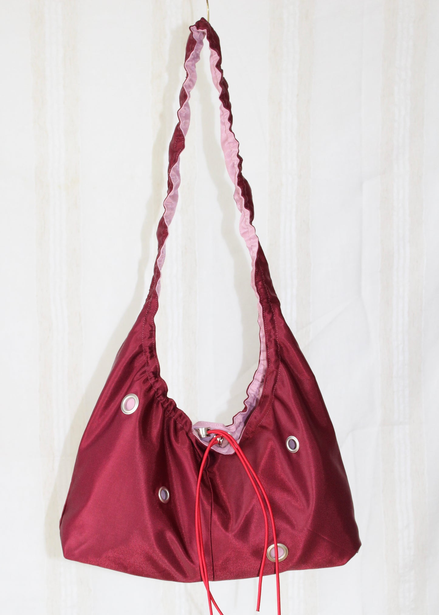 Light pink and red bag