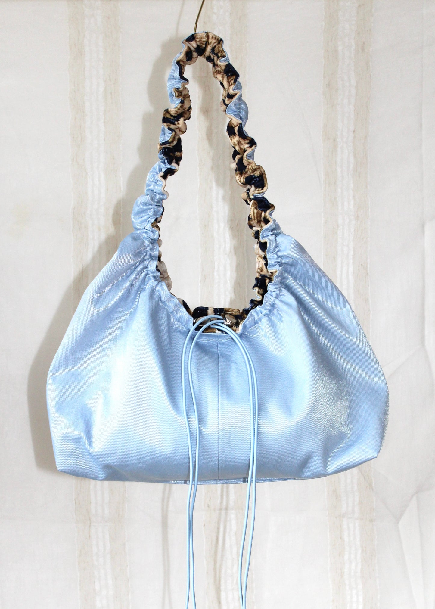 Light blue leo bag