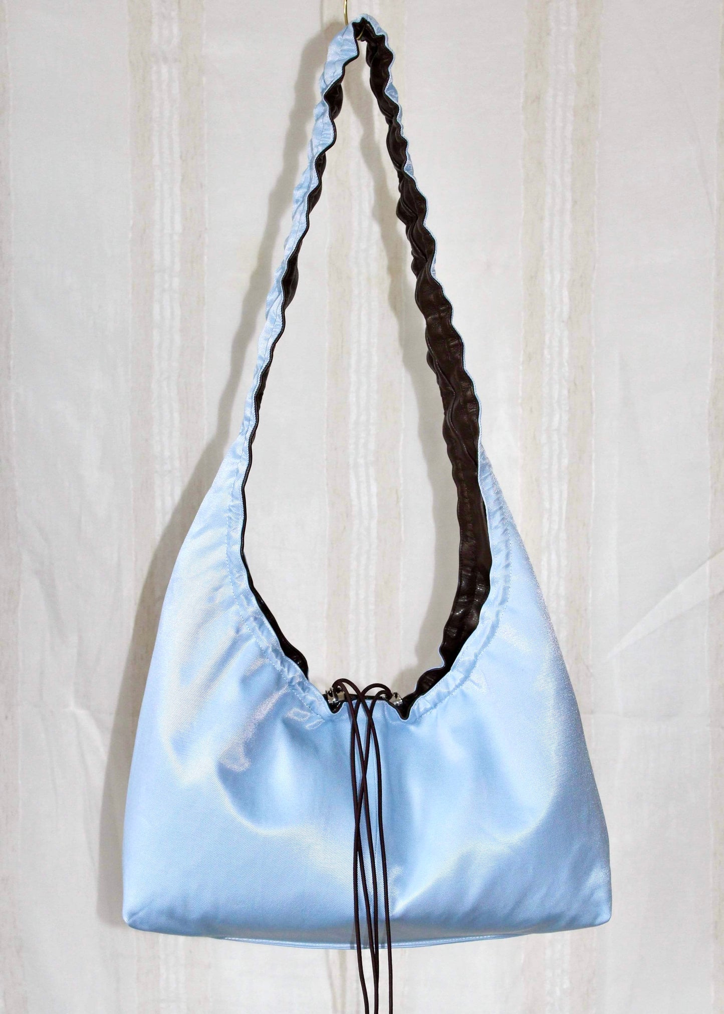 Dark brown and light blue bag