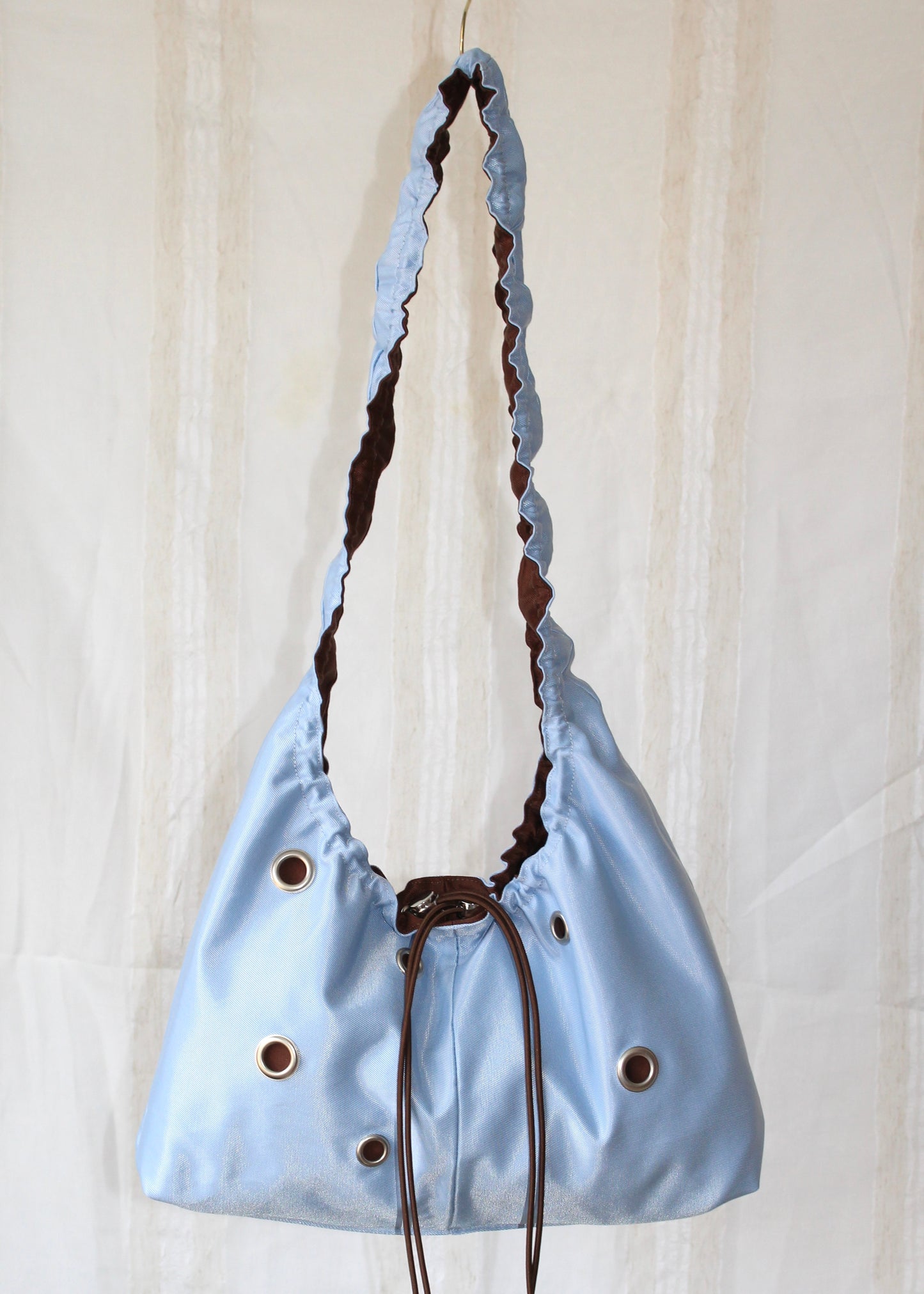 Light blue and brown bag