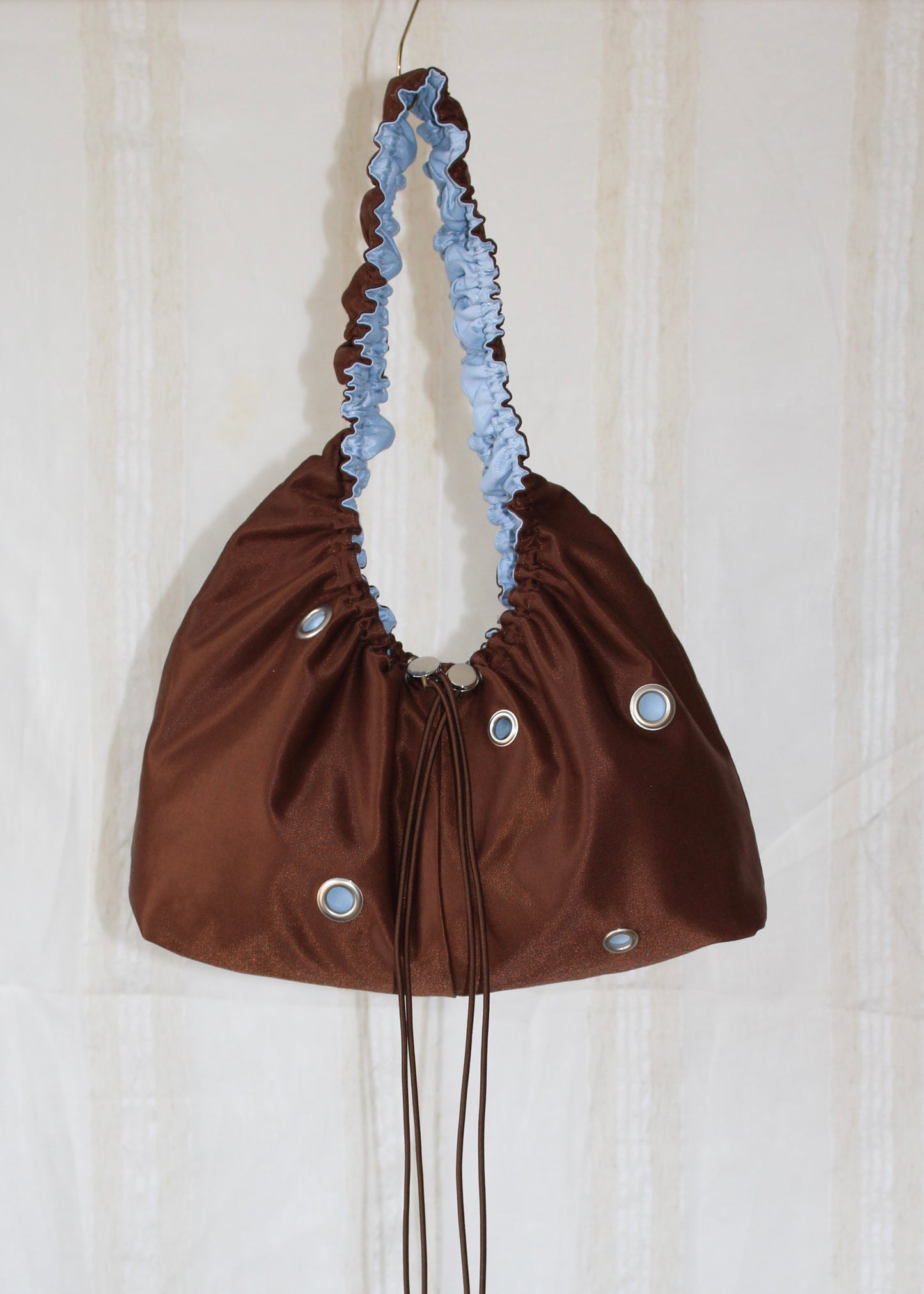 Light blue and brown bag