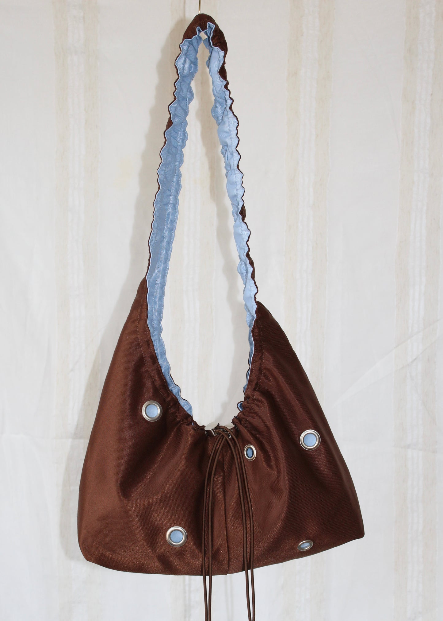 Light blue and brown bag