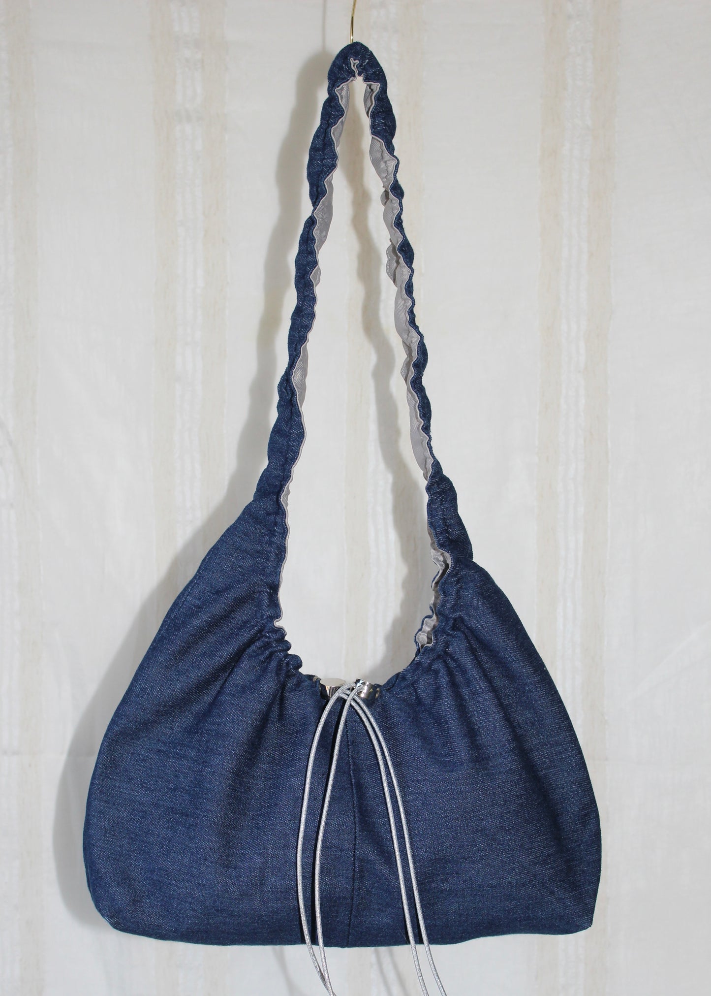 Silver denim bag