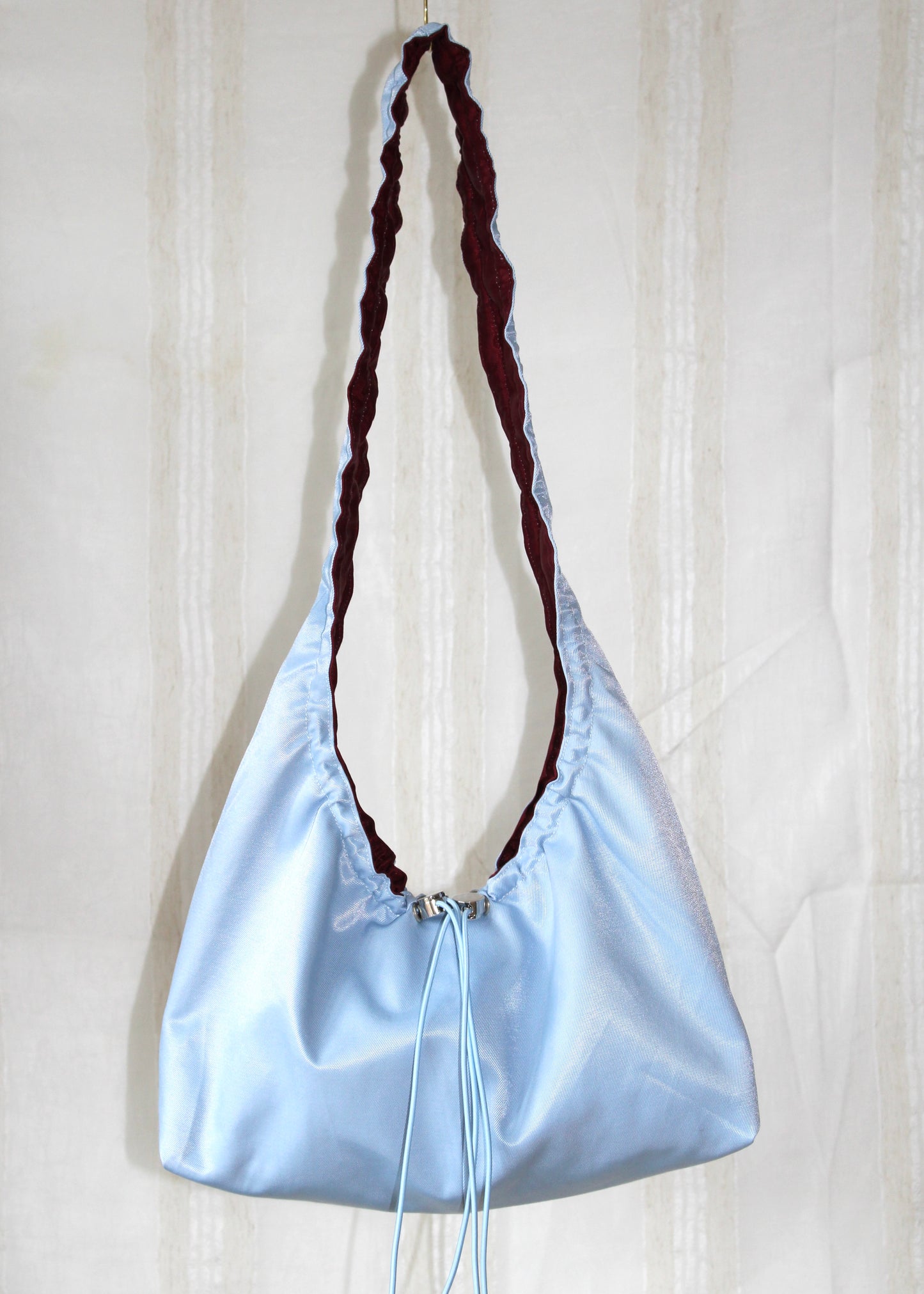 Burgundy red and light blue bag