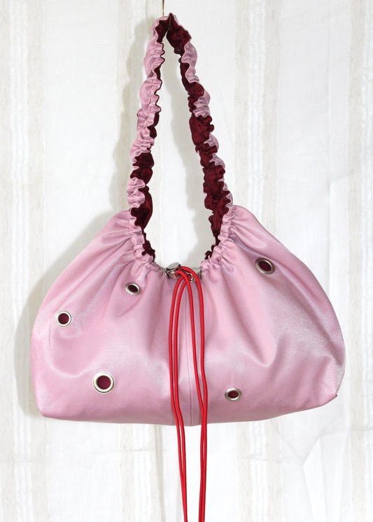 Light pink and red bag