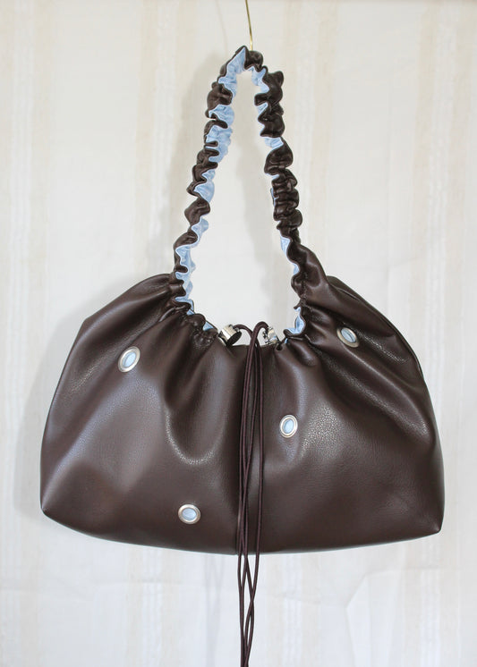 Dark brown and light blue bag